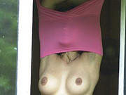 Peek through the window at a changing teen - 15 voyeur Pictures